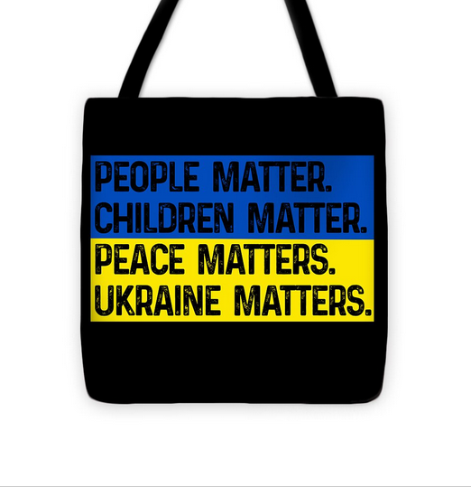 Black tote bag with blue and yellow panel slogan: PEOPLE MATTER, CHILDREN MATTER
