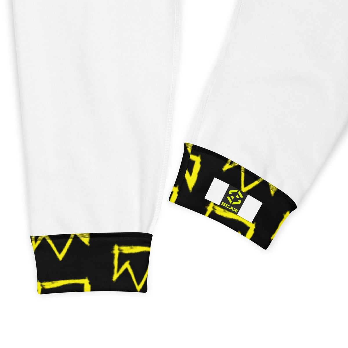 Men's joggers with white fabric and black cuffs featuring yellow graphic print at hem