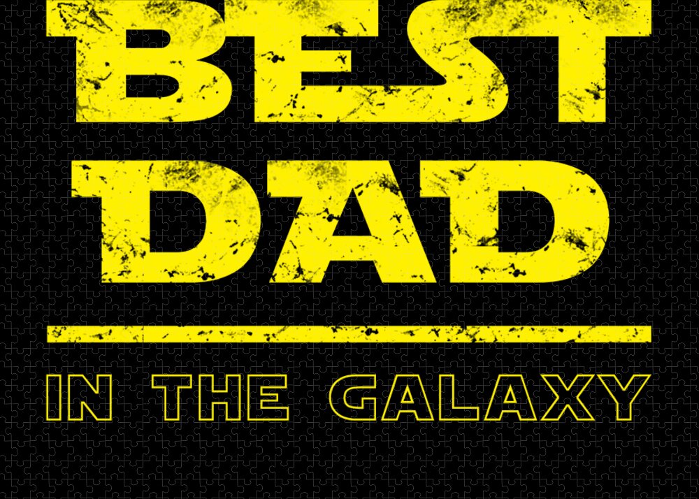 Puzzle with large yellow 'Best Dad' lettering and 'In the Galaxy' at the bottom