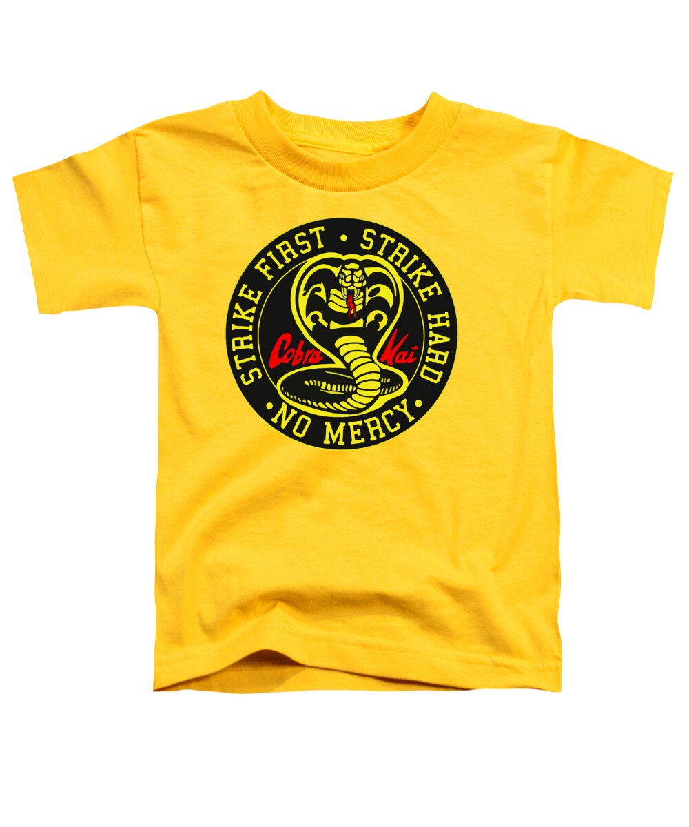 Toddler yellow graphic t-shirt with circular snake emblem and “Strike First” text