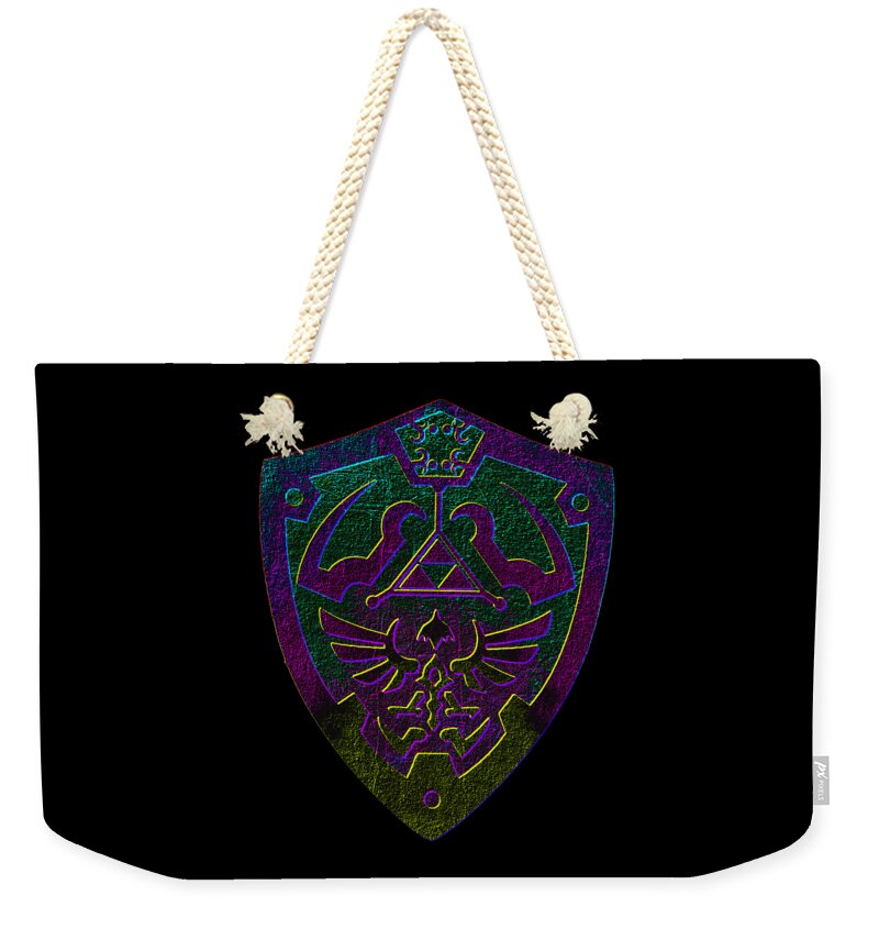 Weekender tote bag with black fabric and large shield emblem, white rope handles with tassel ends