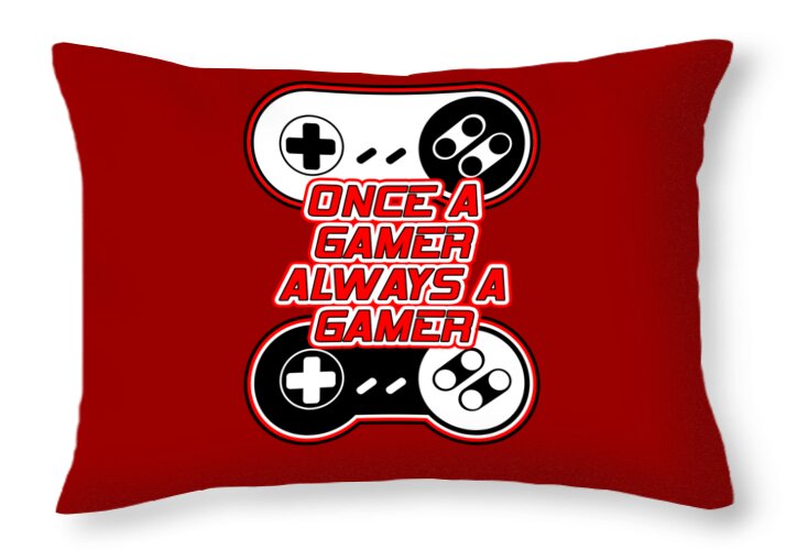 Red rectangular throw pillow with stacked game controller icons and quote text
