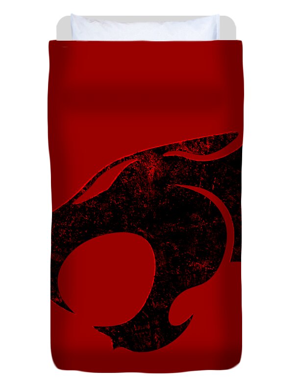 Red duvet cover with partial distressed black cat emblem, angled view
