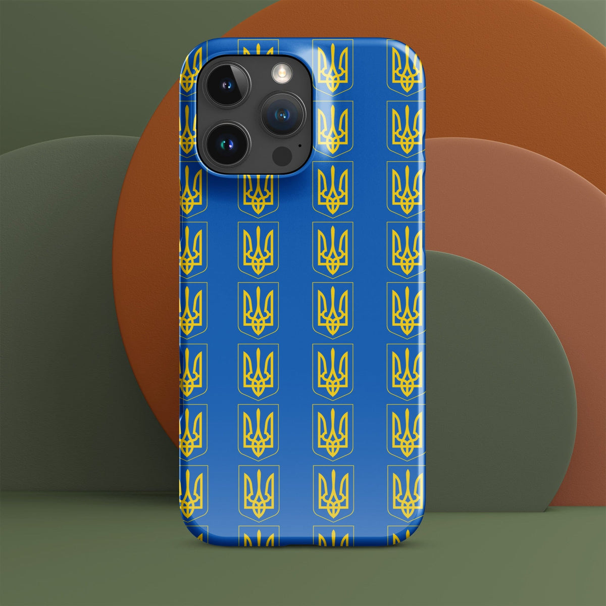 Blue phone case with repeating Tryzub emblems and side buttons visible
