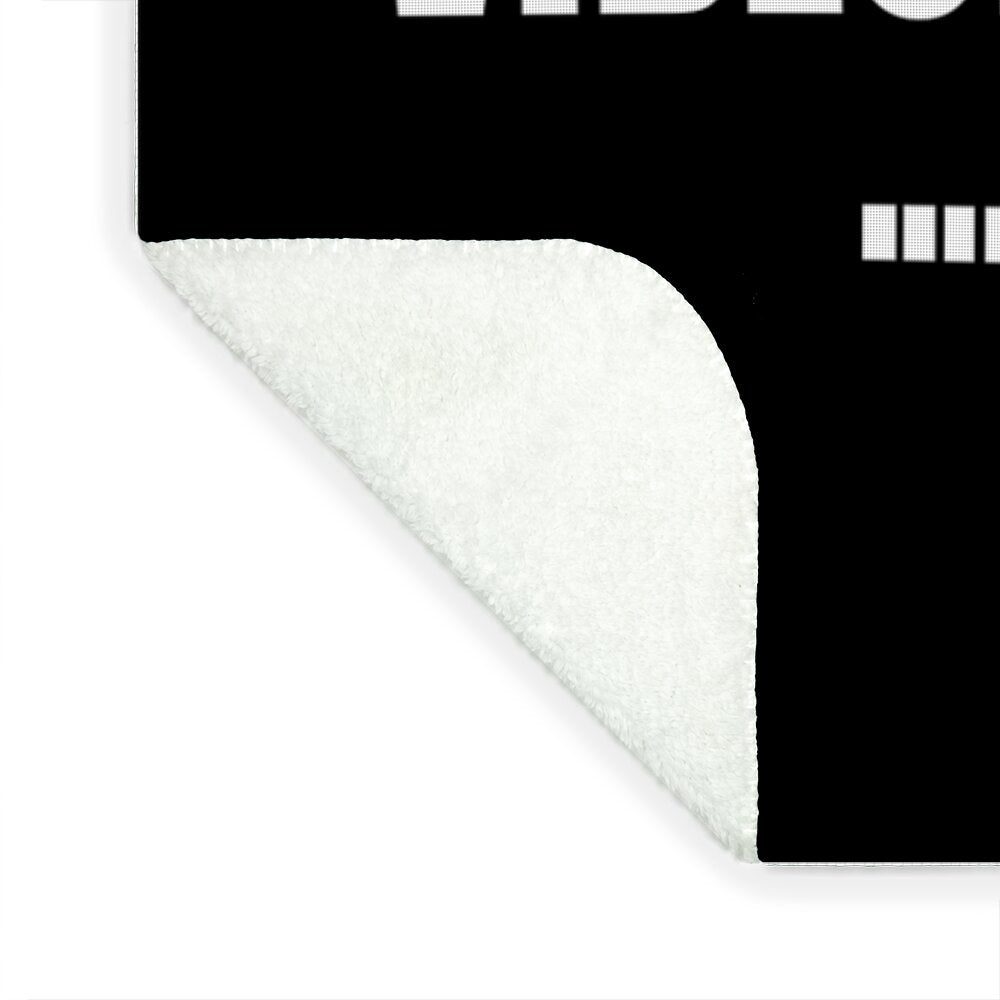White sherpa fleece blanket corner with curved edge and fabric border