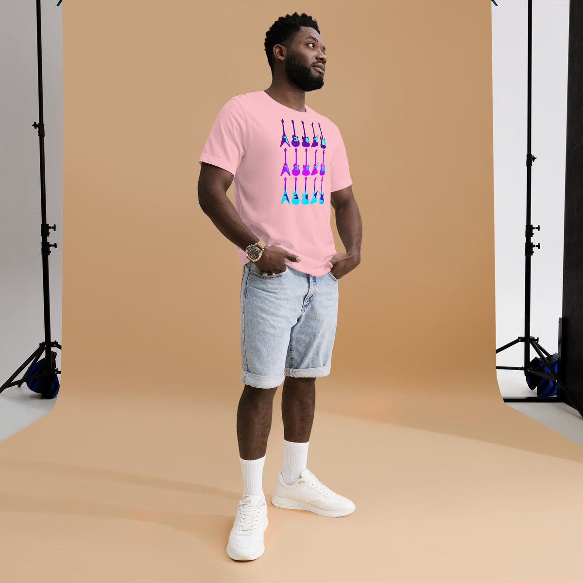 Pink T-shirt with colorful 80s guitar print centered on the chest.