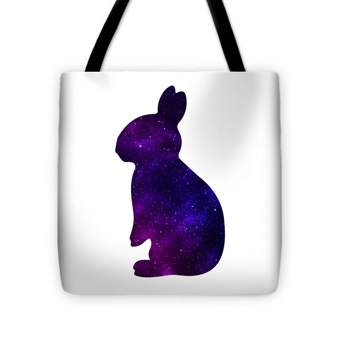 White tote bag with black handles and purple galaxy bunny silhouette