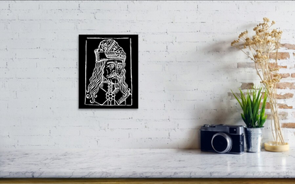 Framed black-and-white woodcut Dracula portrait, intricate linework and ornate crown.