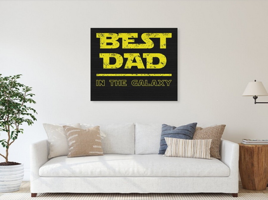 Wood print: “Best Dad in the Galaxy” in yellow on a dark background.