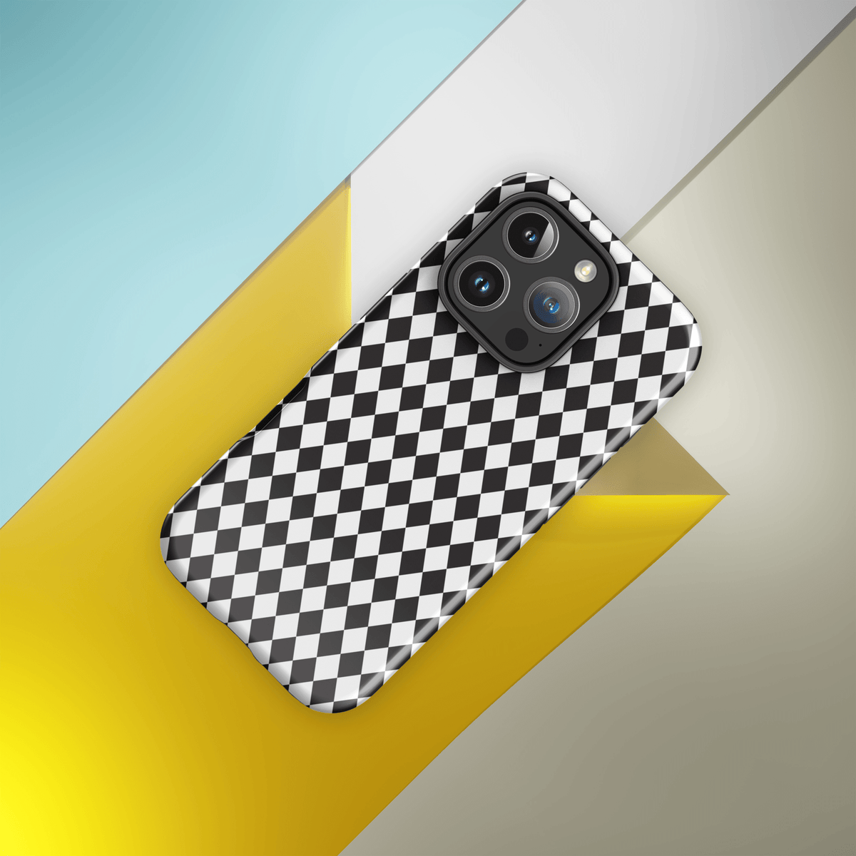 iPhone case with black-and-white diamond check design and protective camera area