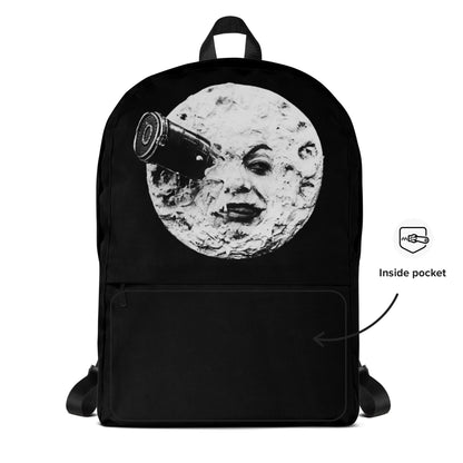 Black backpack front with circular moon artwork and top handle, zip pocket