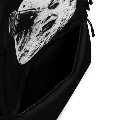 Black backpack with large moon print panel and zippered side pocket detail