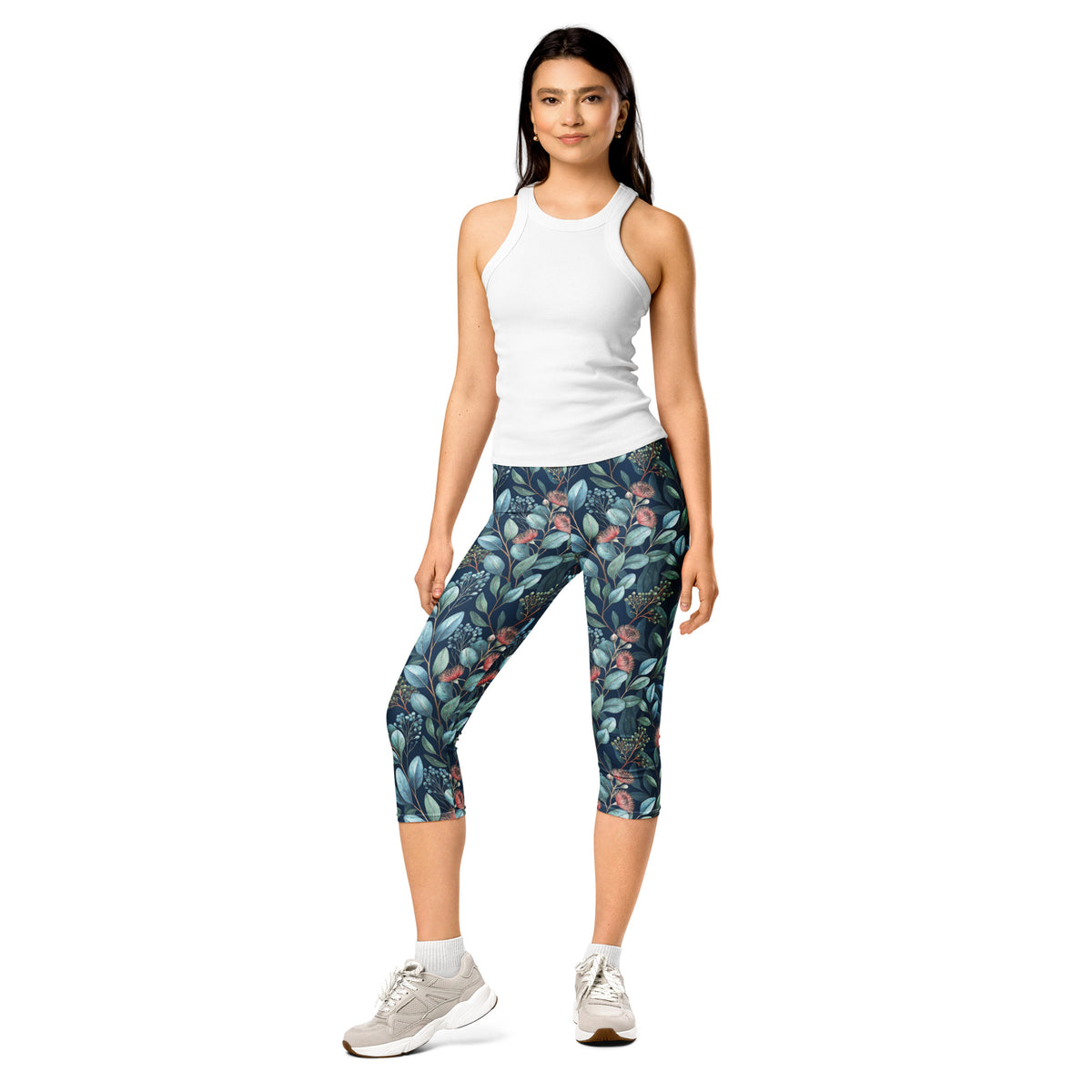 Botanical capri leggings in dark navy with teal leaf design and pink blooms