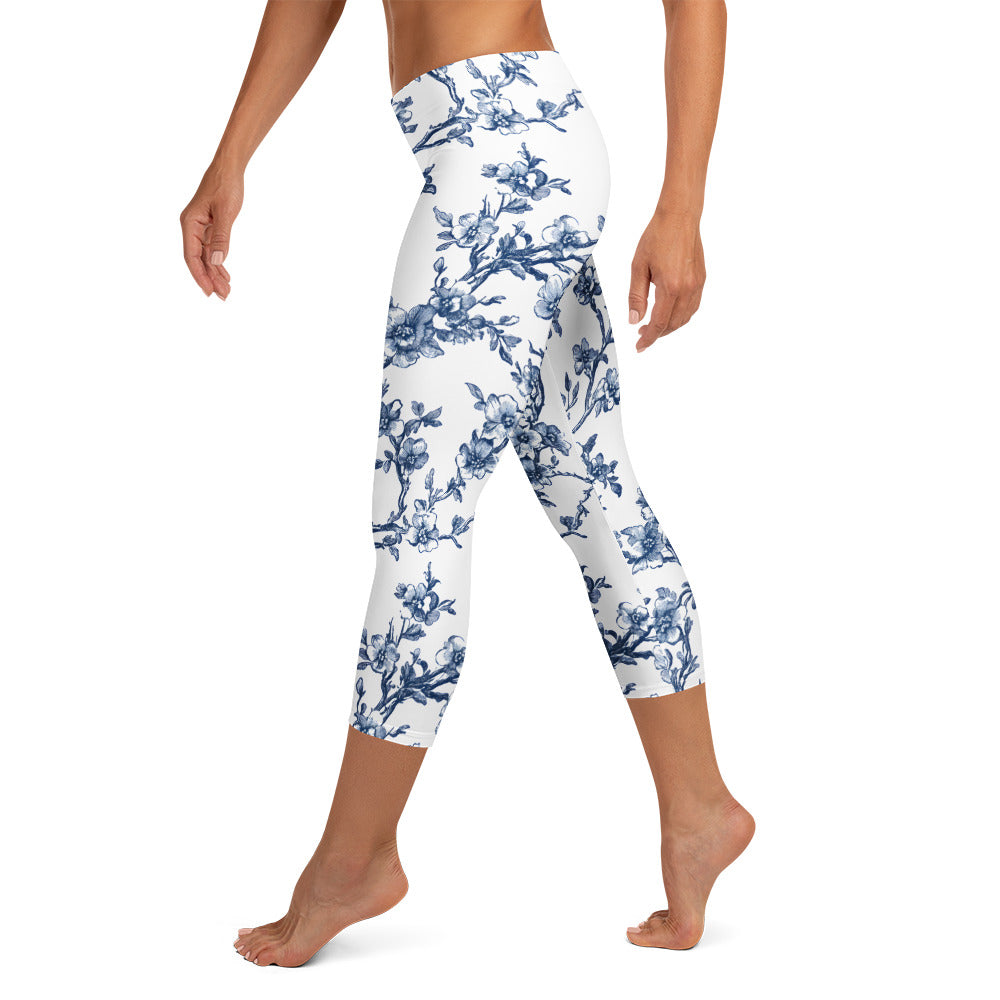 White capri leggings with blue French-style floral print