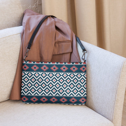 Aztec-pattern crossbody bag with brown top and blue-red-white striped front panel