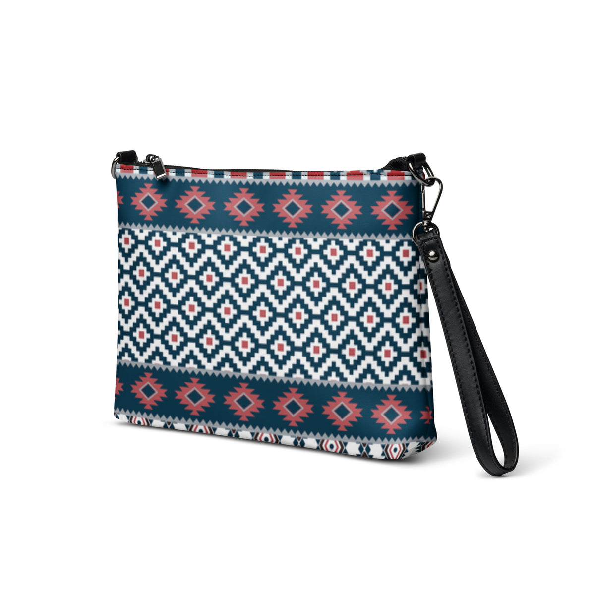 Geometric patterned crossbody bag with black zipper and long strap, angled front view