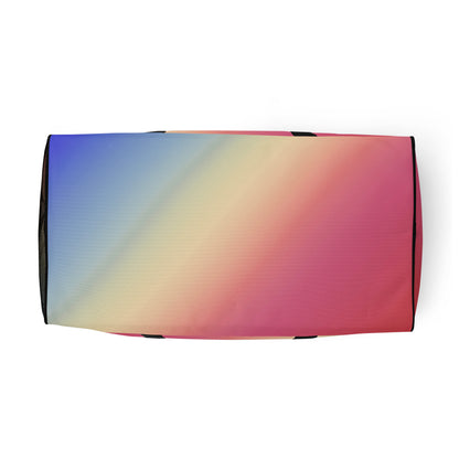 Gradient duffle bag in pink, blue, and cream with zippered end panel