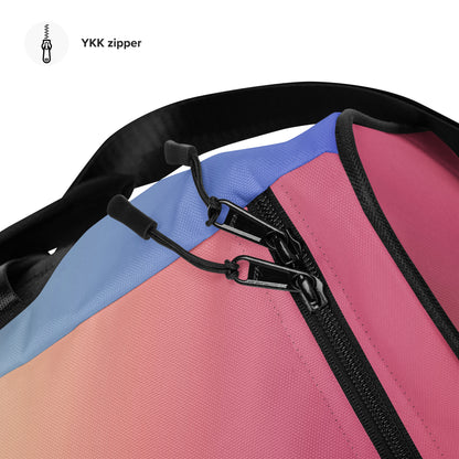 Duffle bag zipper close-up with black pull, multicolor panel, and stitched trim