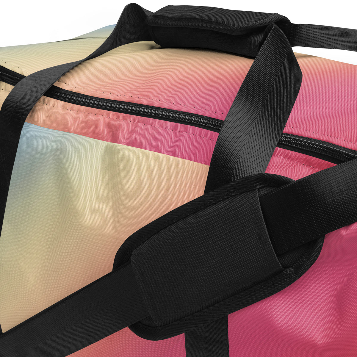 Gradient duffle bag close-up with black zipper and mesh panel, blue to pink striped fabric
