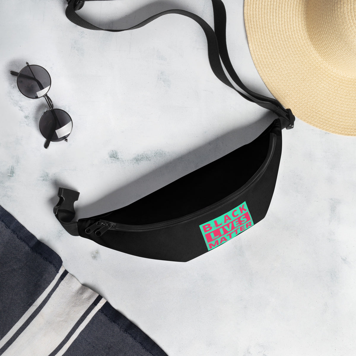 Black fanny pack with adjustable strap and “BLACK LIVES MATTER” patch on front side.