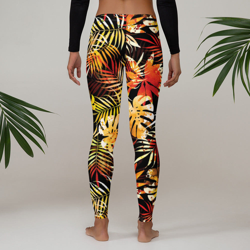 Women's tropical leaf print leggings with bold yellow, red, and green leaves