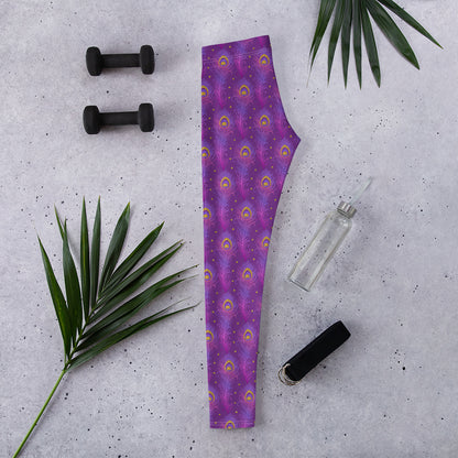 Purple peacock-feather pattern leggings laid flat