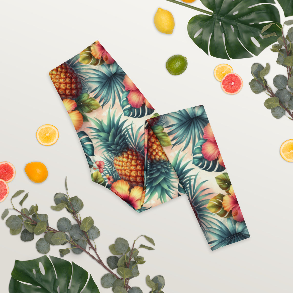 Tropical print leggings fabric featuring pineapples and palm leaves, multicolor design