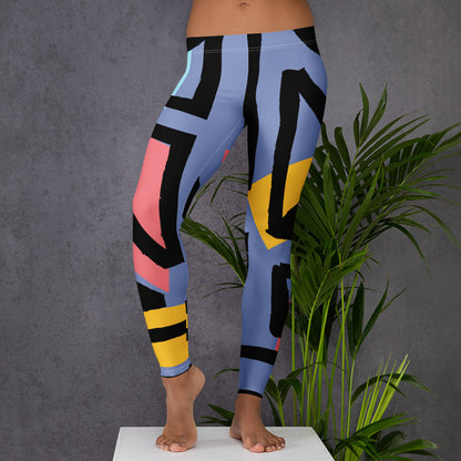 Blue geometric leggings with black, yellow, and pink stripe blocks, ankle length visible.