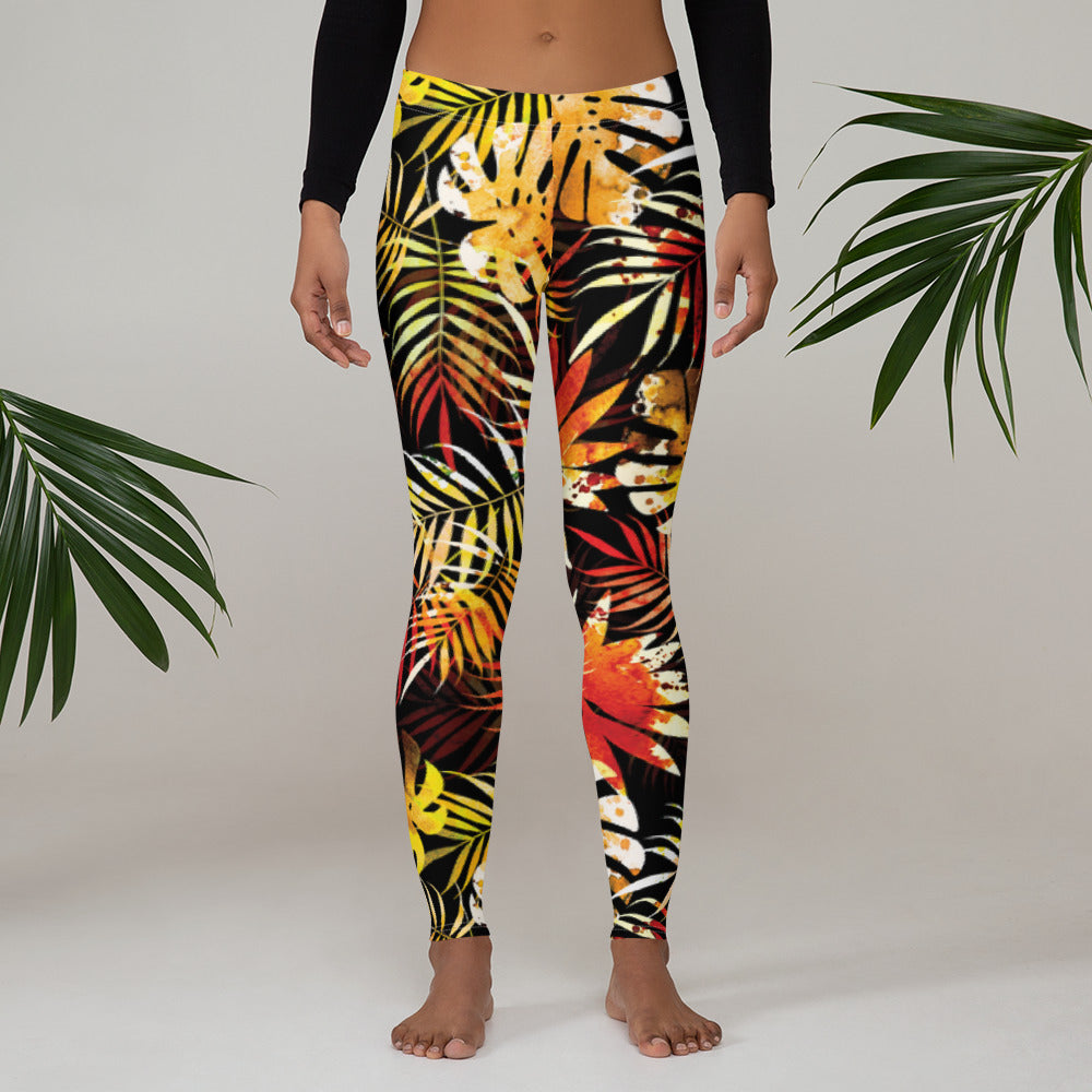 Women's mid-rise leggings with black, yellow, and red tropical leaf print