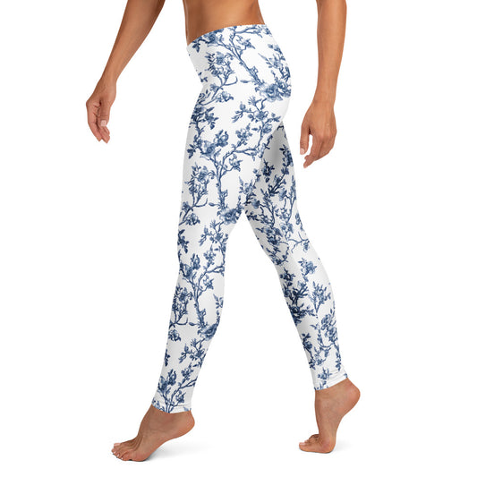 White leggings with blue vine floral print, full-length ankle style