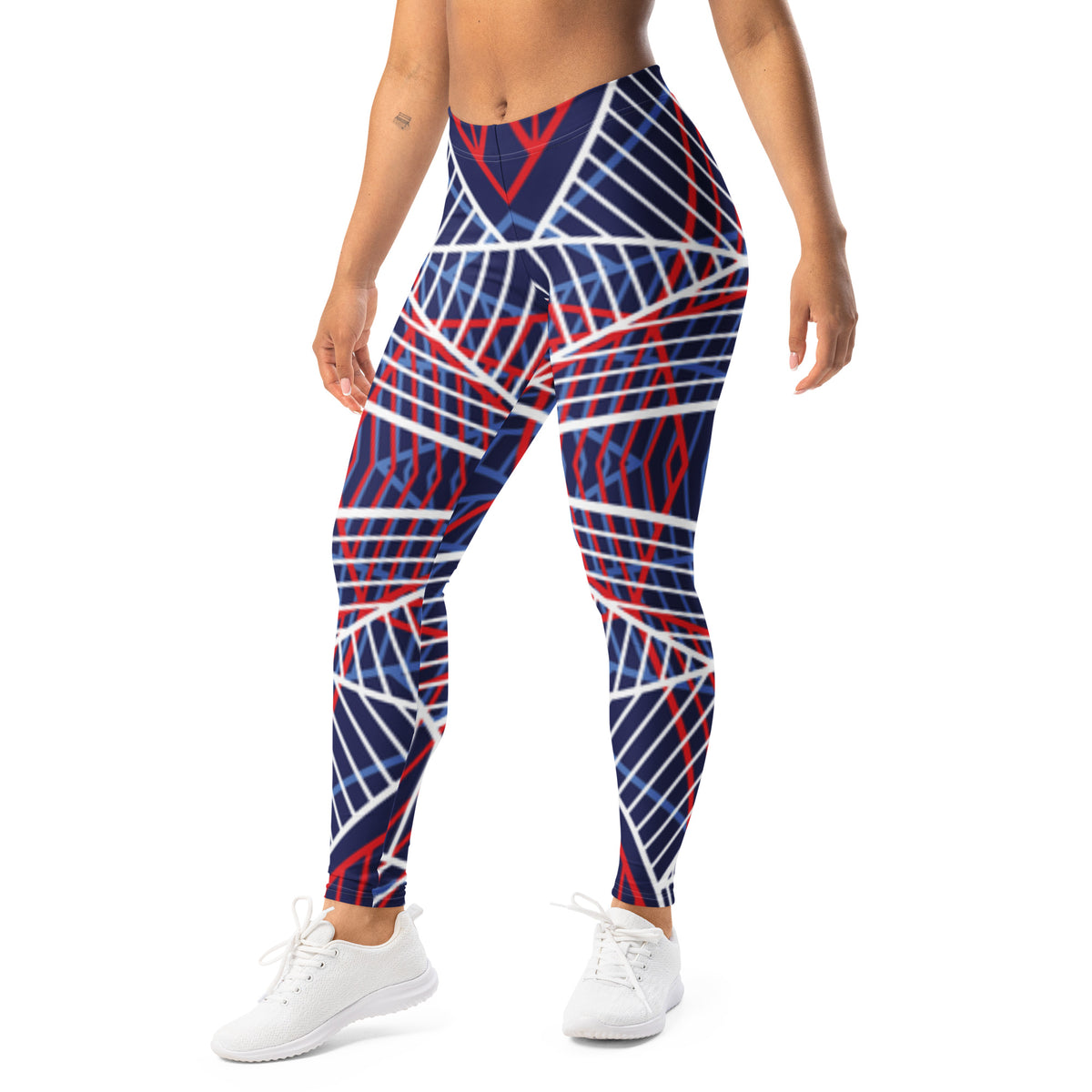 Women’s navy leggings with red and white abstract line pattern, standing front view.