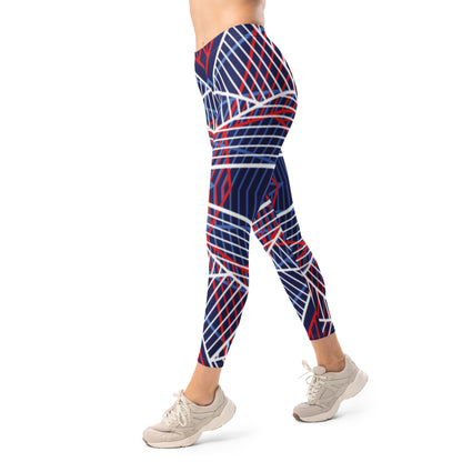 Women’s navy leggings with red and white abstract line pattern, side walking view.