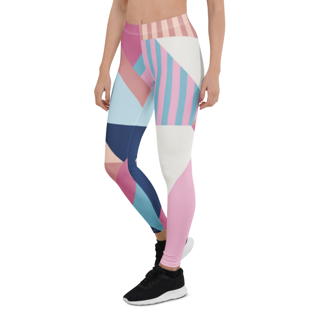 Women’s leggings with pastel geometric blocks and striped panels, full-length, side view.