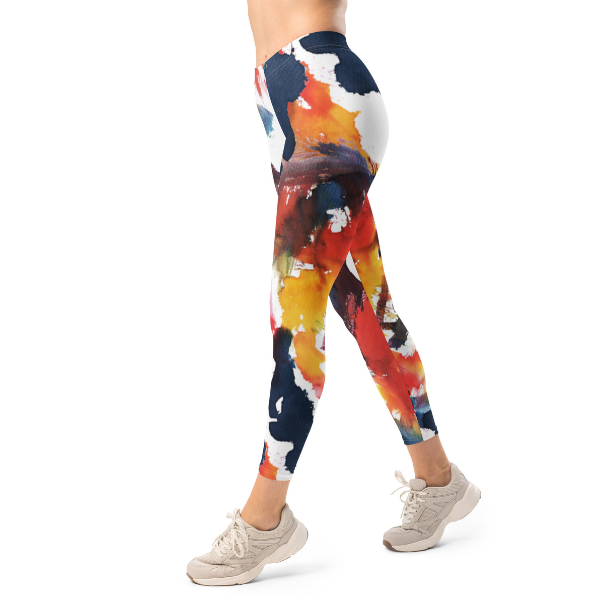 Women’s colorful leggings with navy waist and abstract red, yellow, white splatter