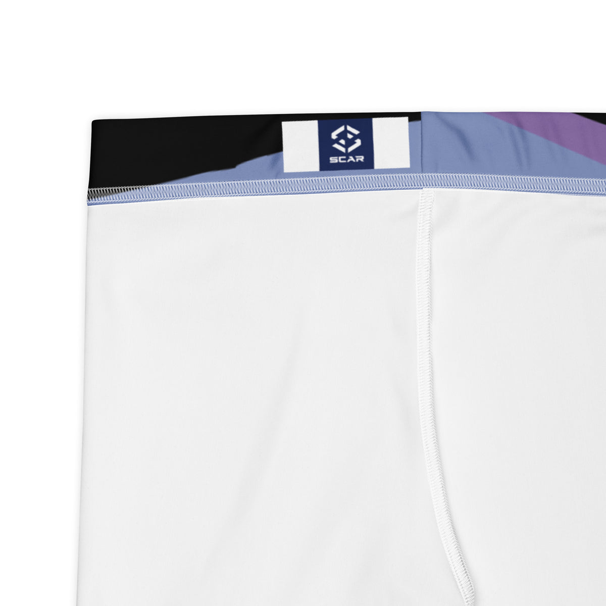 Leggings waistband close-up with black top band, light blue seam, and small logo label