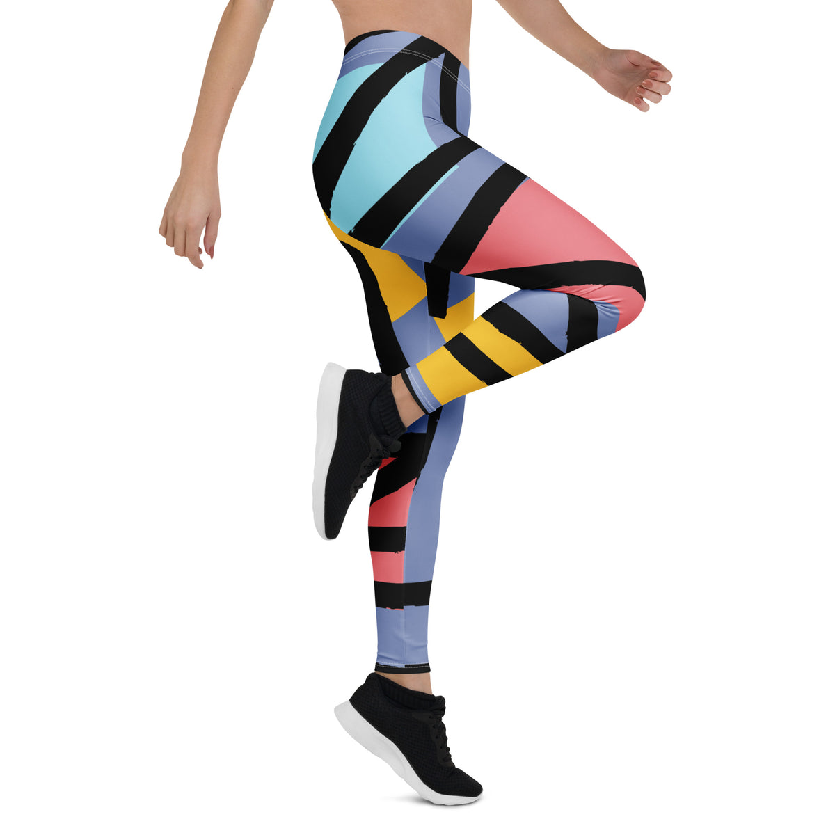 Geometric leggings with blue base and black, yellow, and pink angular stripe design
