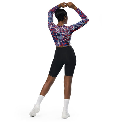 Navy long-sleeve crop top with geometric red and white line pattern, back view