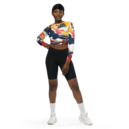 Long-sleeve crop top with abstract multicolor print, crew neck, cropped hem.