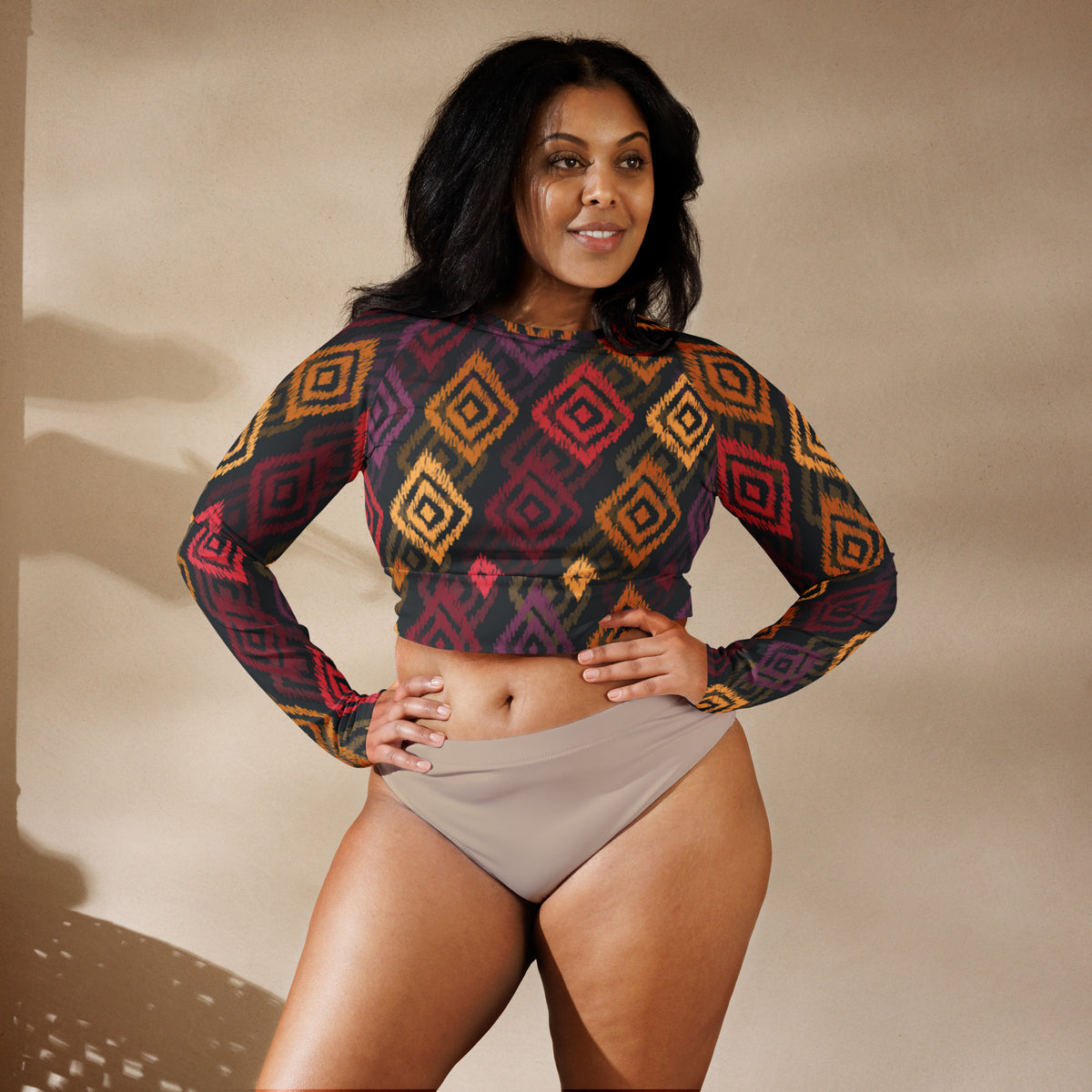 Geometric long-sleeve crop top, multicolor diamond pattern with cropped waist