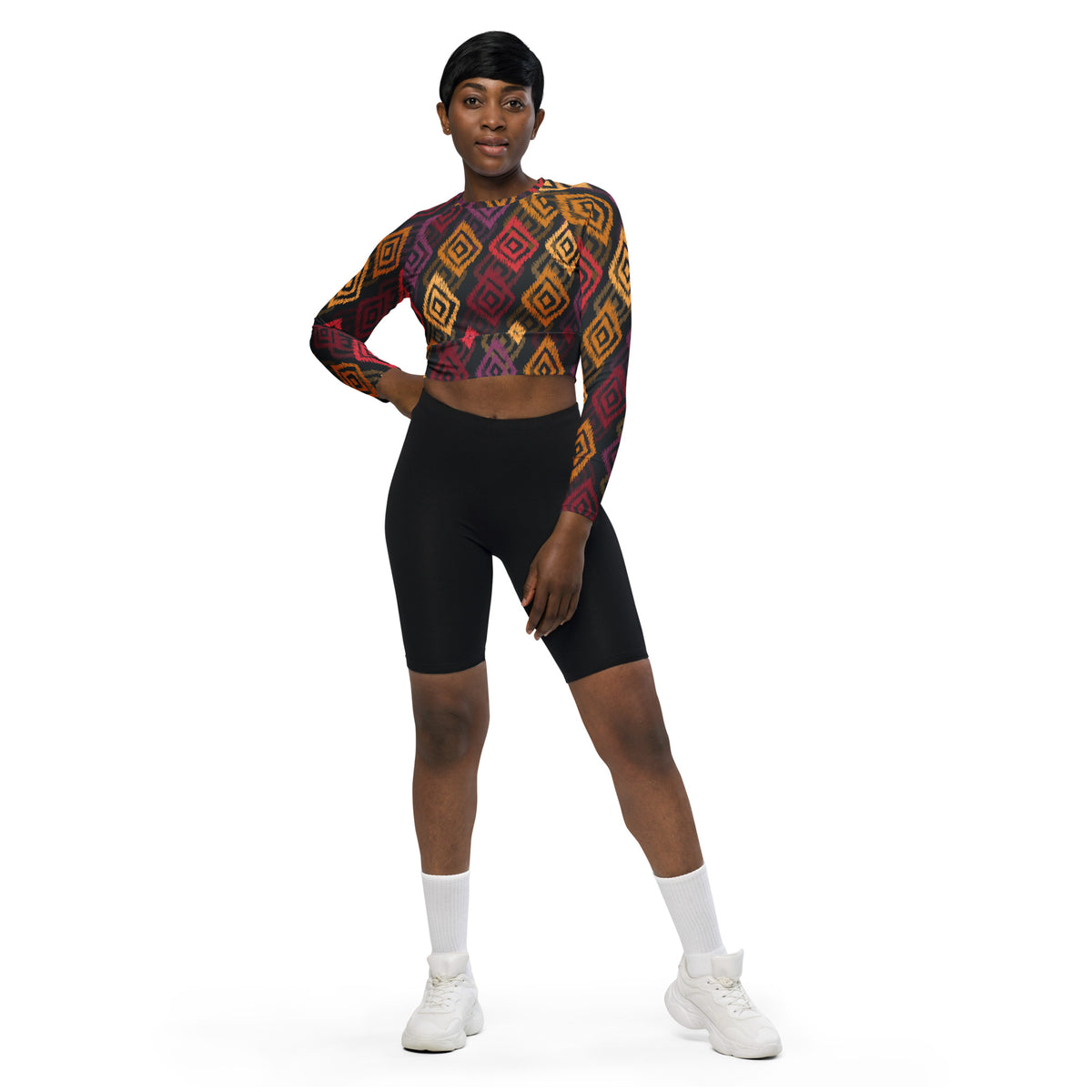 Geometric long-sleeve crop top with multicolor diamond pattern and cropped length