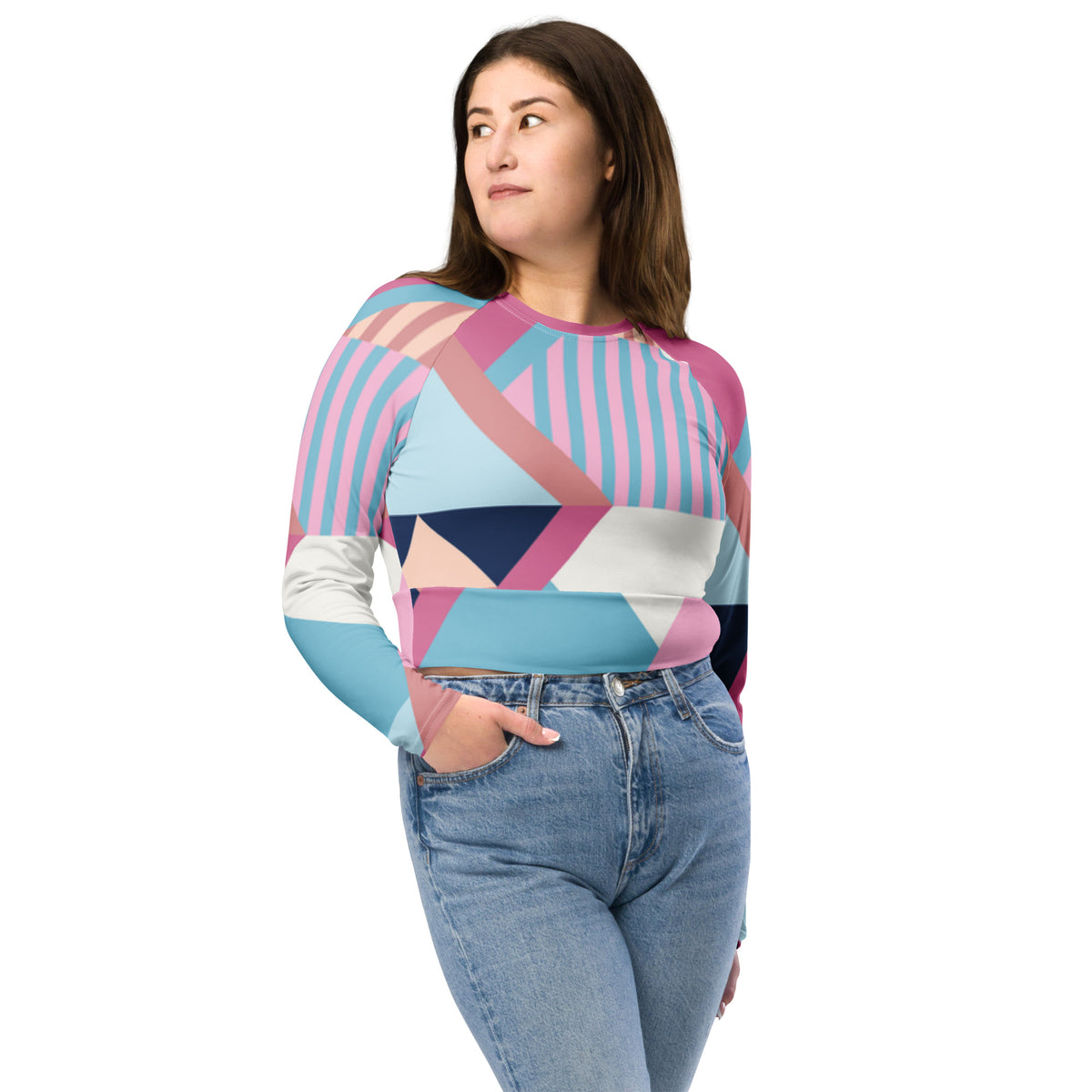 Long-sleeve crop top with pink, blue, and white geometric print on a crew neck