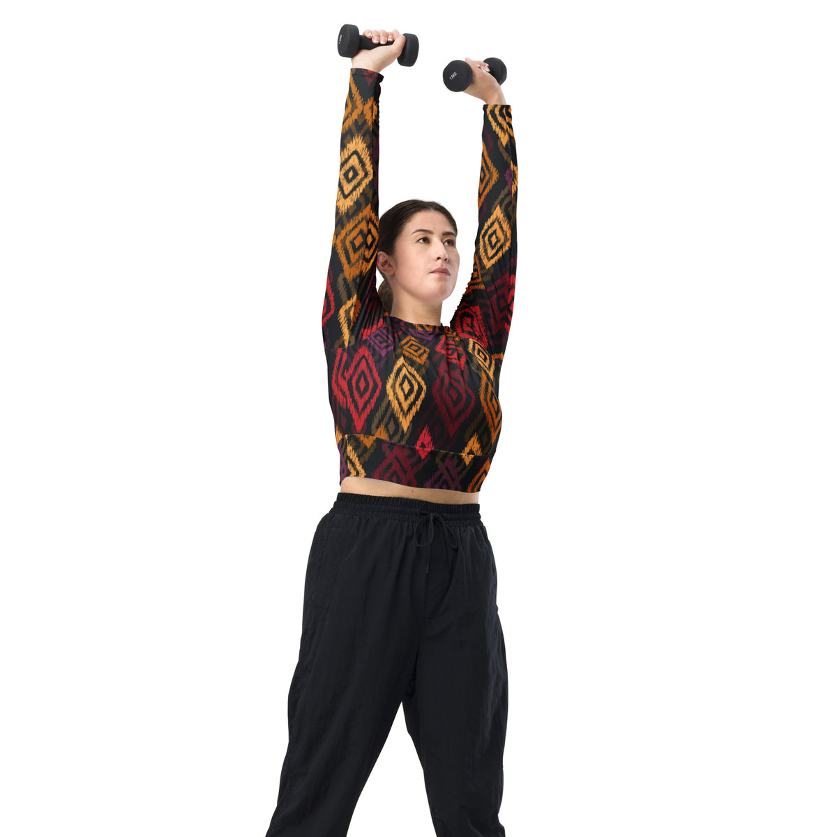 Geometric long-sleeve crop top viewed from front, multicolor diamond print