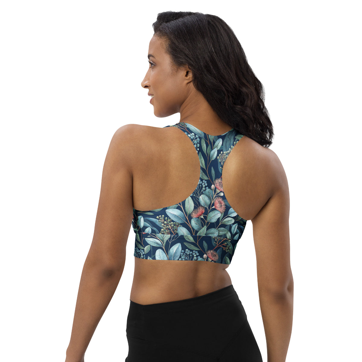 Side view longline sports bra with blue botanical print and racerback straps