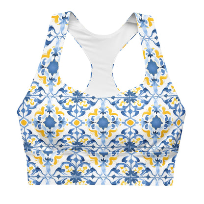 Longline sports bra with Moroccan tile print in blue and yellow, white mesh racerback