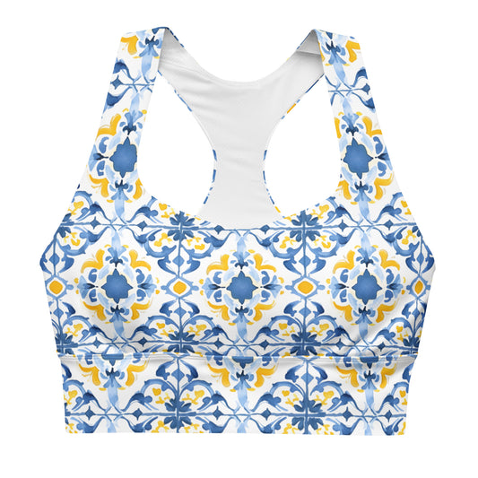 Longline sports bra with Moroccan tile print in blue and yellow, white mesh racerback