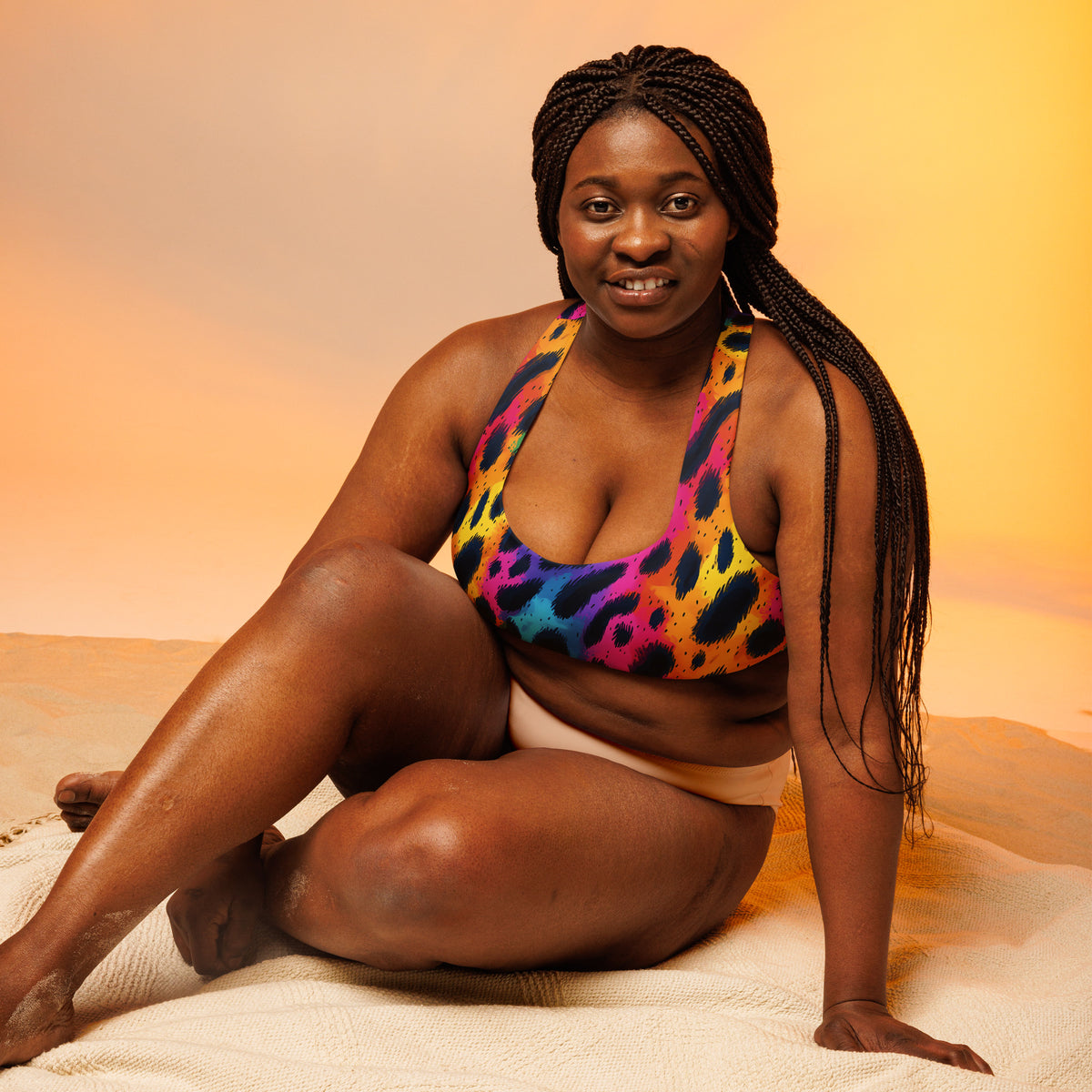 Longline sports bra in rainbow leopard print with supportive racerback fit