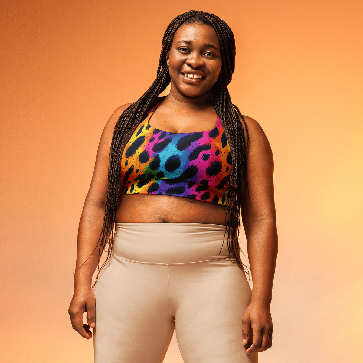 Longline sports bra, rainbow leopard print with wide hem and racerback straps