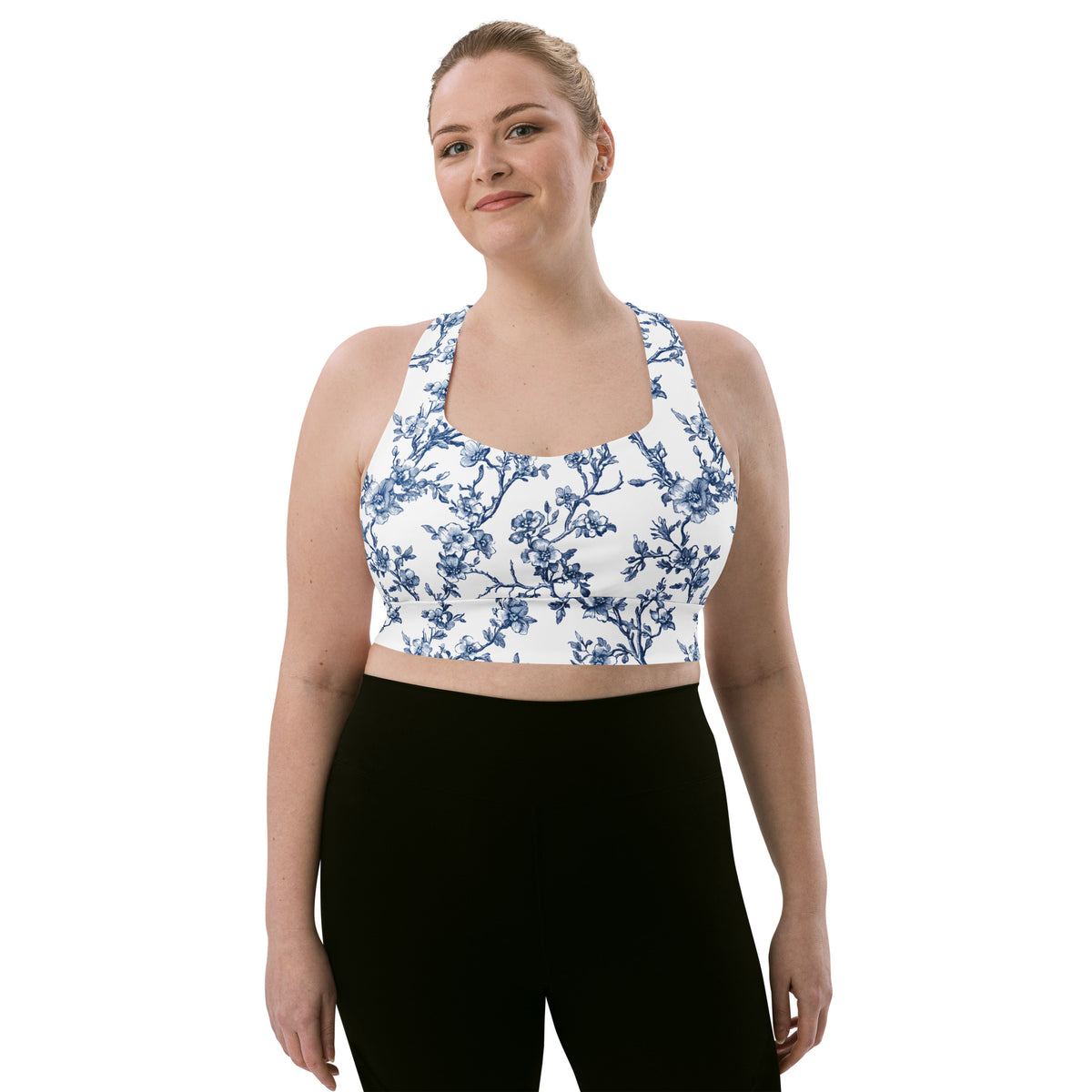 Longline sports bra with blue floral print and square neckline with racerback