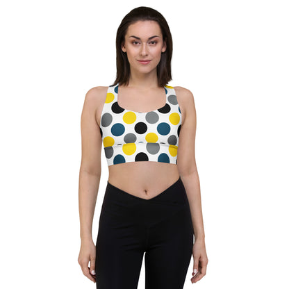 Dots longline sports bra front view with multicolor circular print and cropped length