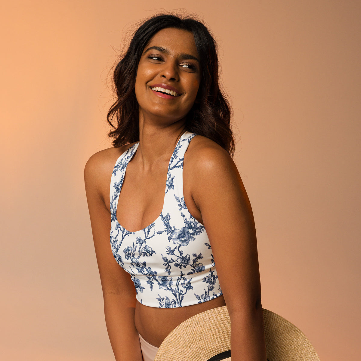 Blue floral longline sports bra with scoop front and racerback straps